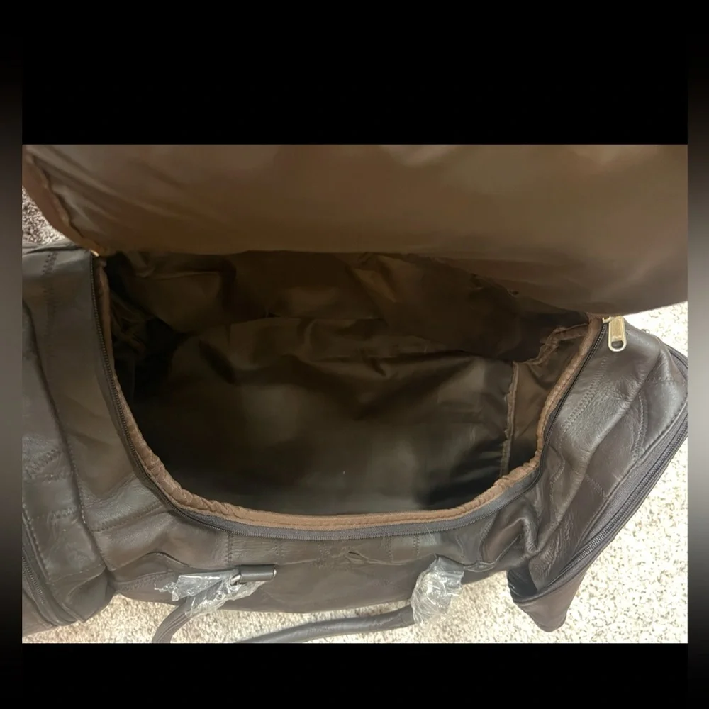 NEW BROWN DUFFLE BAG WITH ACCESSORIES